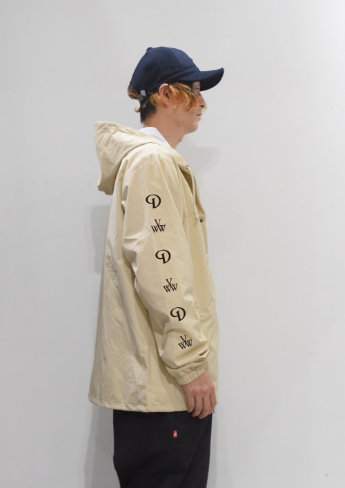 coatch_jacket_beige_side.jpg